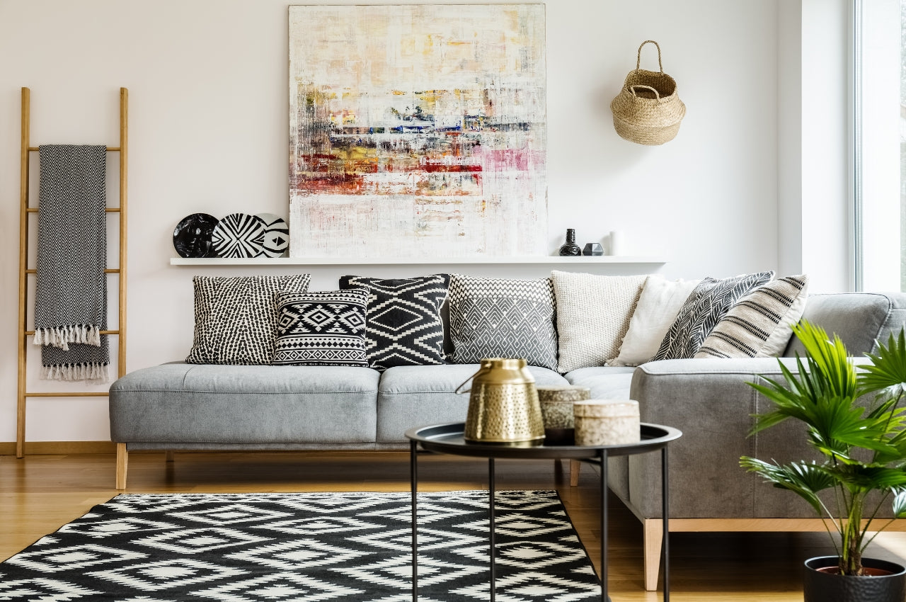 A photo of a living room as featured image for a blog about home furniture placement for feng shui