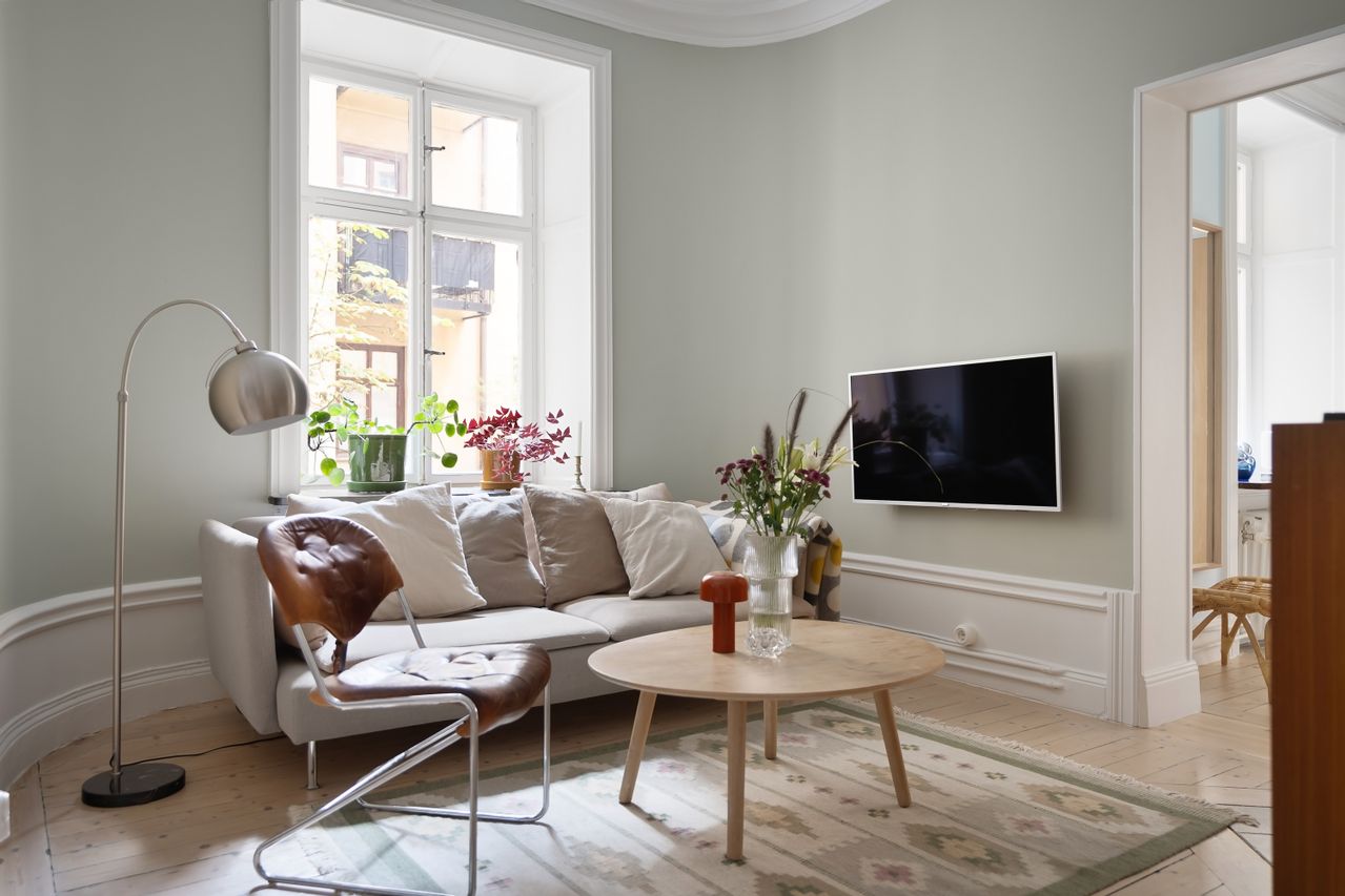 Living room featuring a coffee table and minimalist seating
