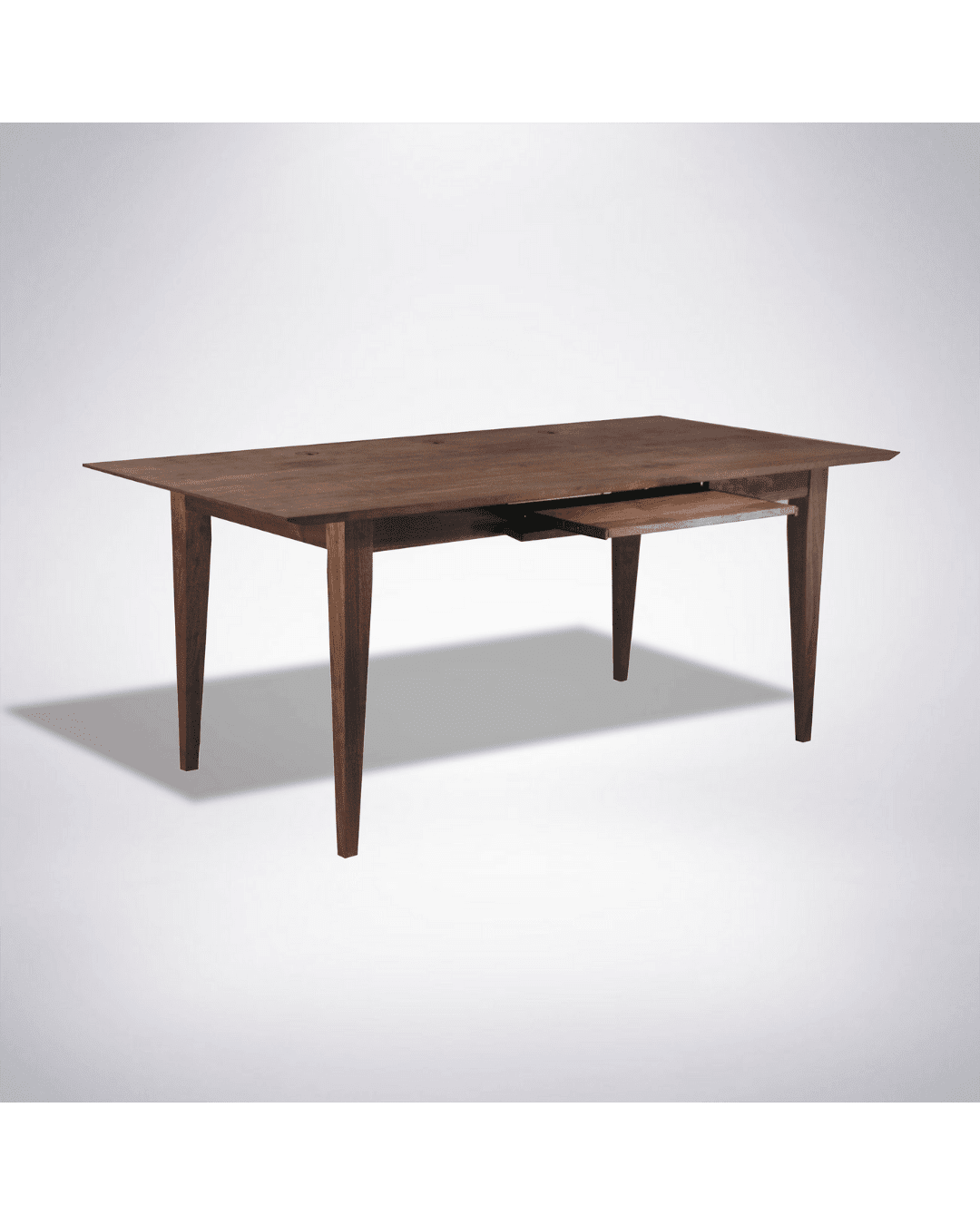 The Enso Desk by TY Fine Furniture is a solid wood, handmade artisan piece with tapered legs, an extendable leaf, and subtle wire management accents, shown against a white background.