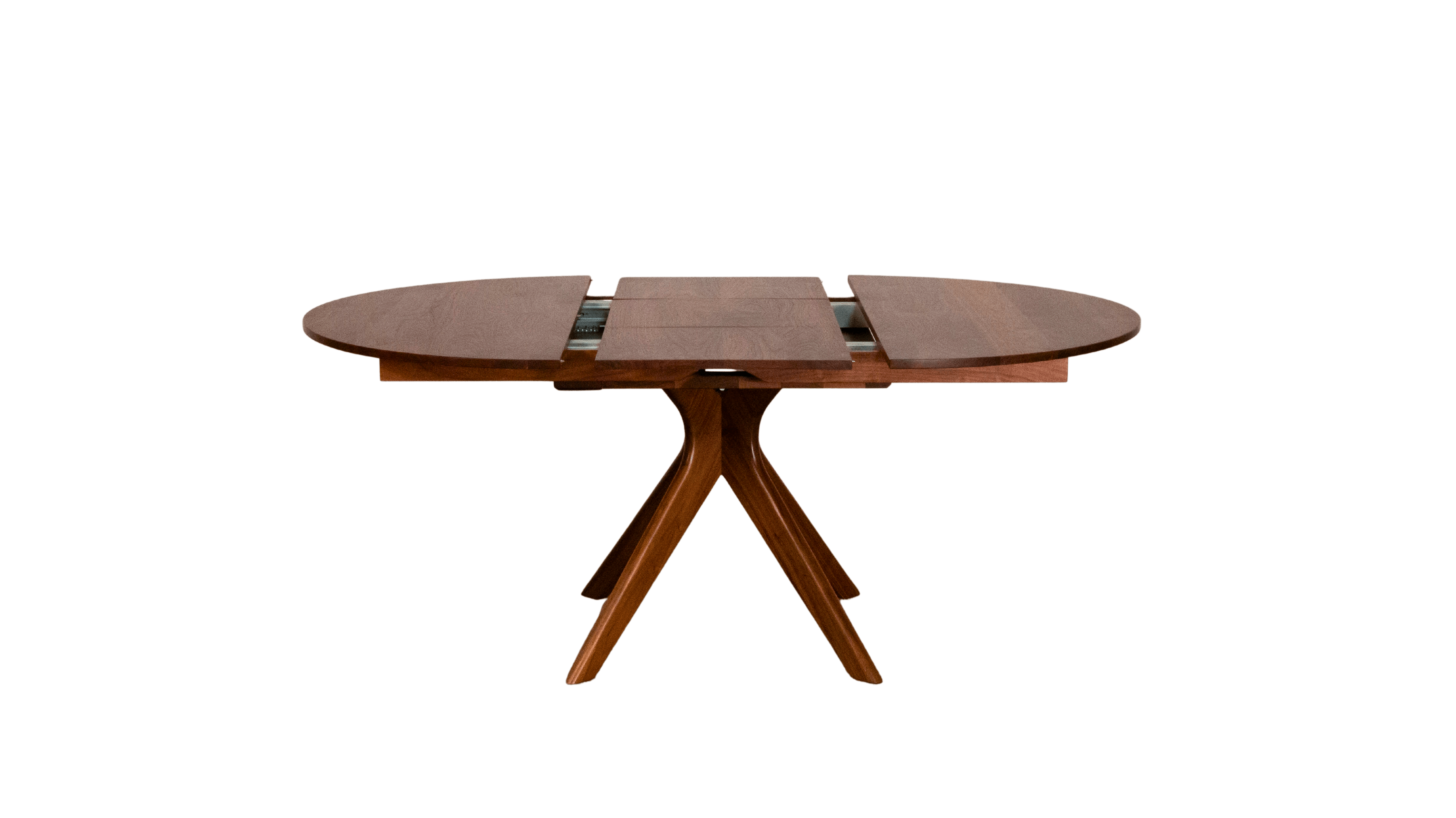 The Strata Extendable Round Dining Dinette Table by TY Fine Furniture features solid wood, rounded ends, a central leaf extension, and four angled legs meeting at the center, shown against a plain white background.