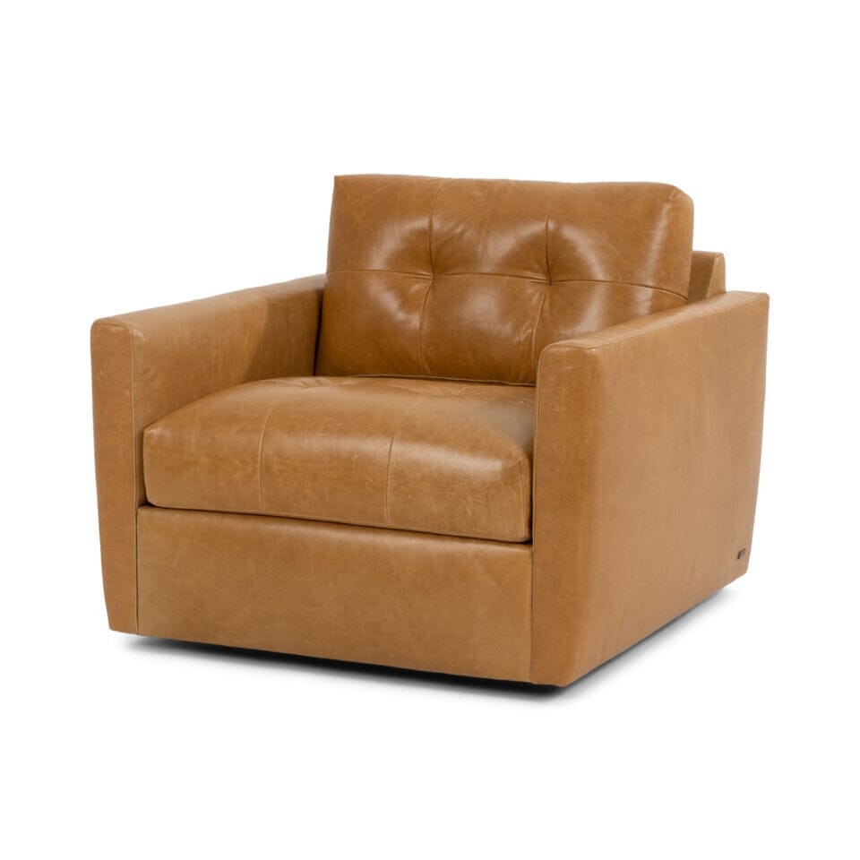 The American Leather CARMET Chair features a modern square design, light brown leather upholstery, tufted back, high-density foam cushions for comfort, and wide armrests.
