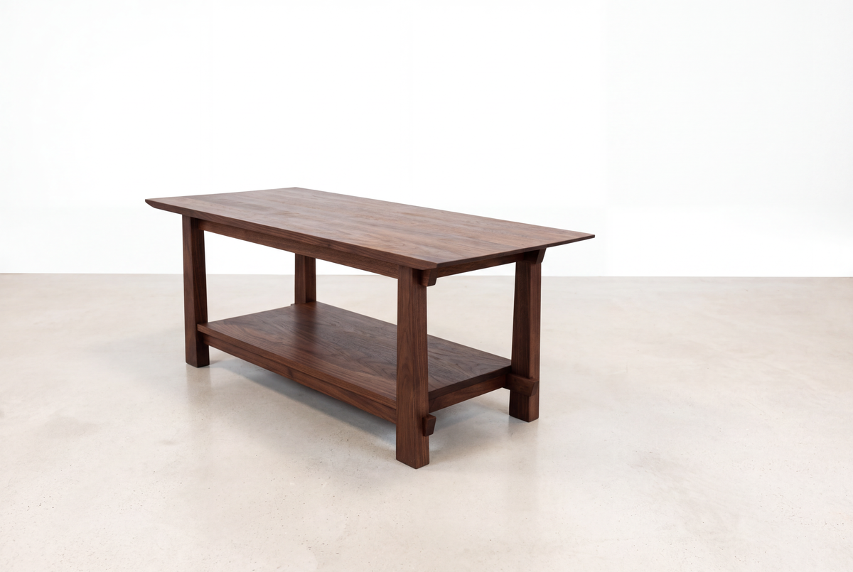 Introducing the Solid Walnut Horizon Coffee Table from the Horizon Collection by TY Fine Furniture—this rectangular table exemplifies Japanese craftsmanship with its solid walnut construction and features a convenient lower shelf. Elegantly displayed on a light-colored floor against a plain white background, it serves as a perfect choice for modern interior furniture.