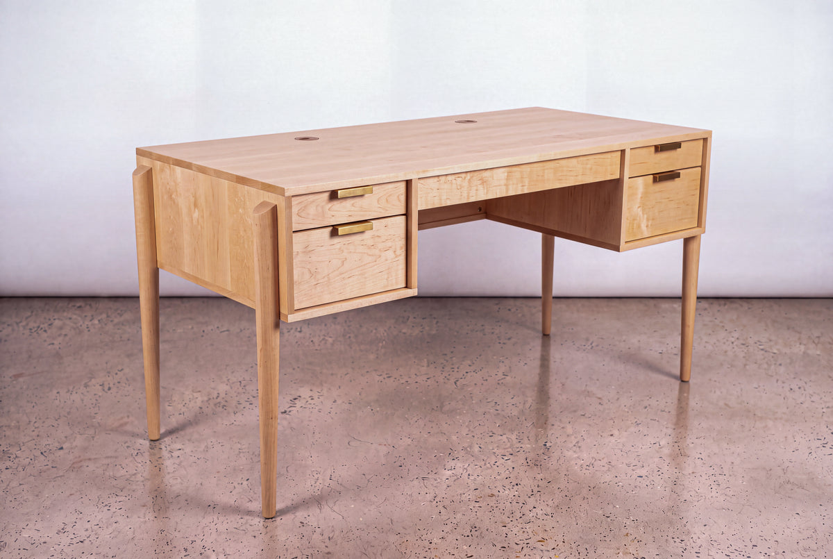 The Solid Maple Executive Desk - Apollo Collection | TY Fine Furniture features four drawers, brass handles, and tapered legs—ideal for a stylish home office.