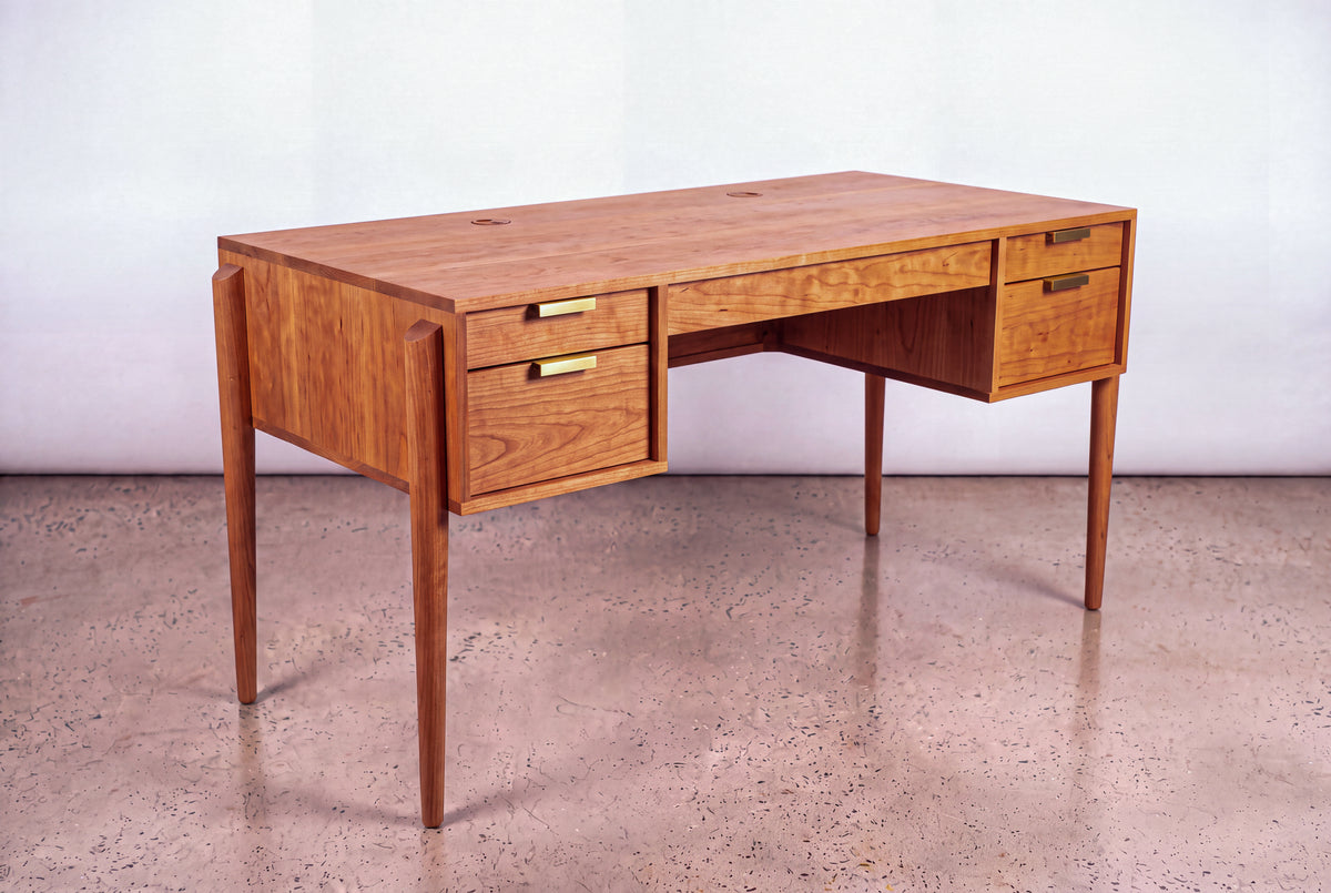 The Solid Cherry Executive Desk - Apollo Collection | TY Fine Furniture features four drawers with brass handles, a smooth finish, and tapered legs—ideal for elevating any home office furniture setup.