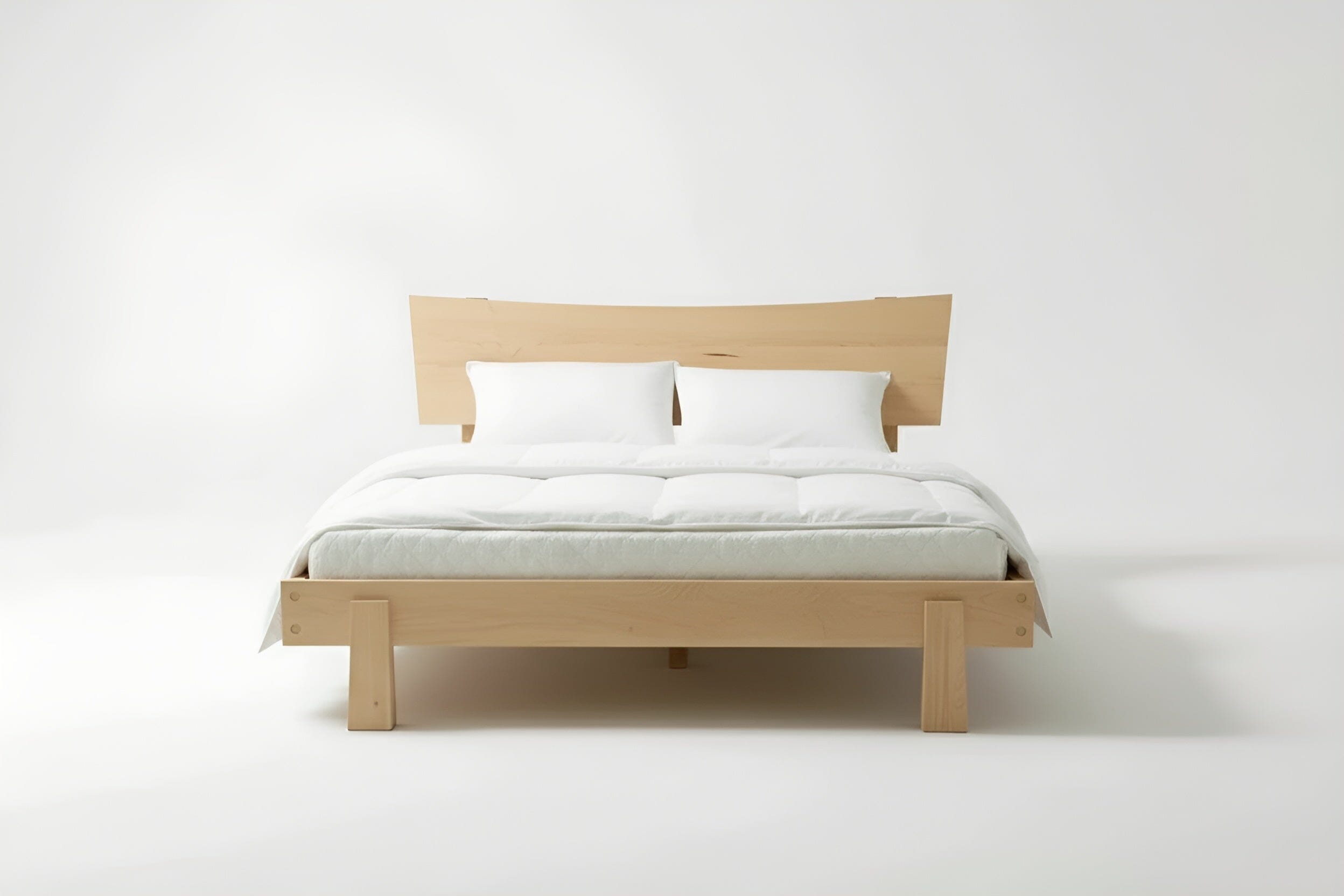 Front view of the Horizon Platform Bed in solid wood maple, inside a bedroom with Japandi aesthetic. This bed frame is made in USA.