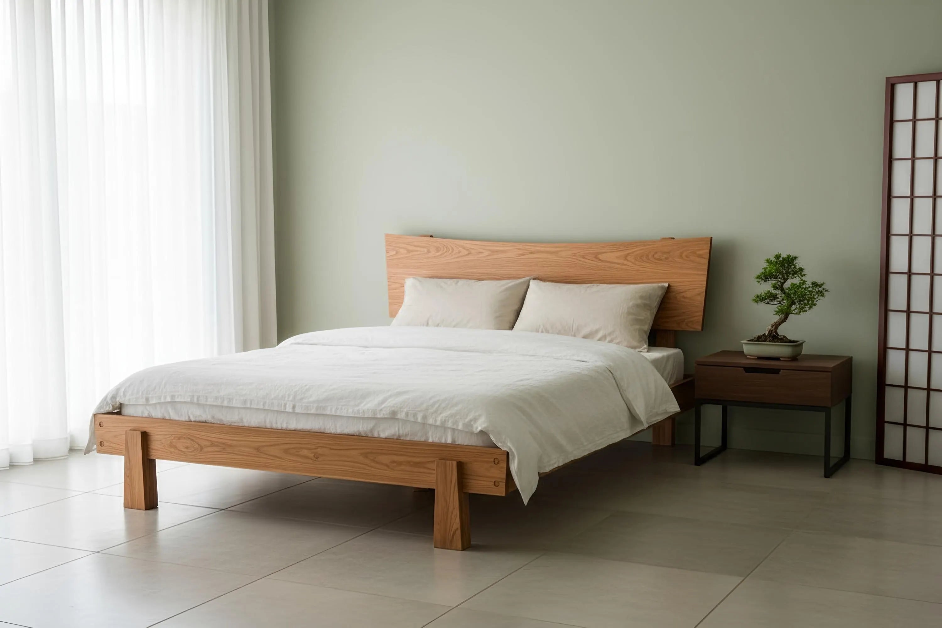 Wooden bed with white bedding in a minimalistic bedroom setting. Bed is the Horizon Platform Bed, made in USA, using natural hardwood.