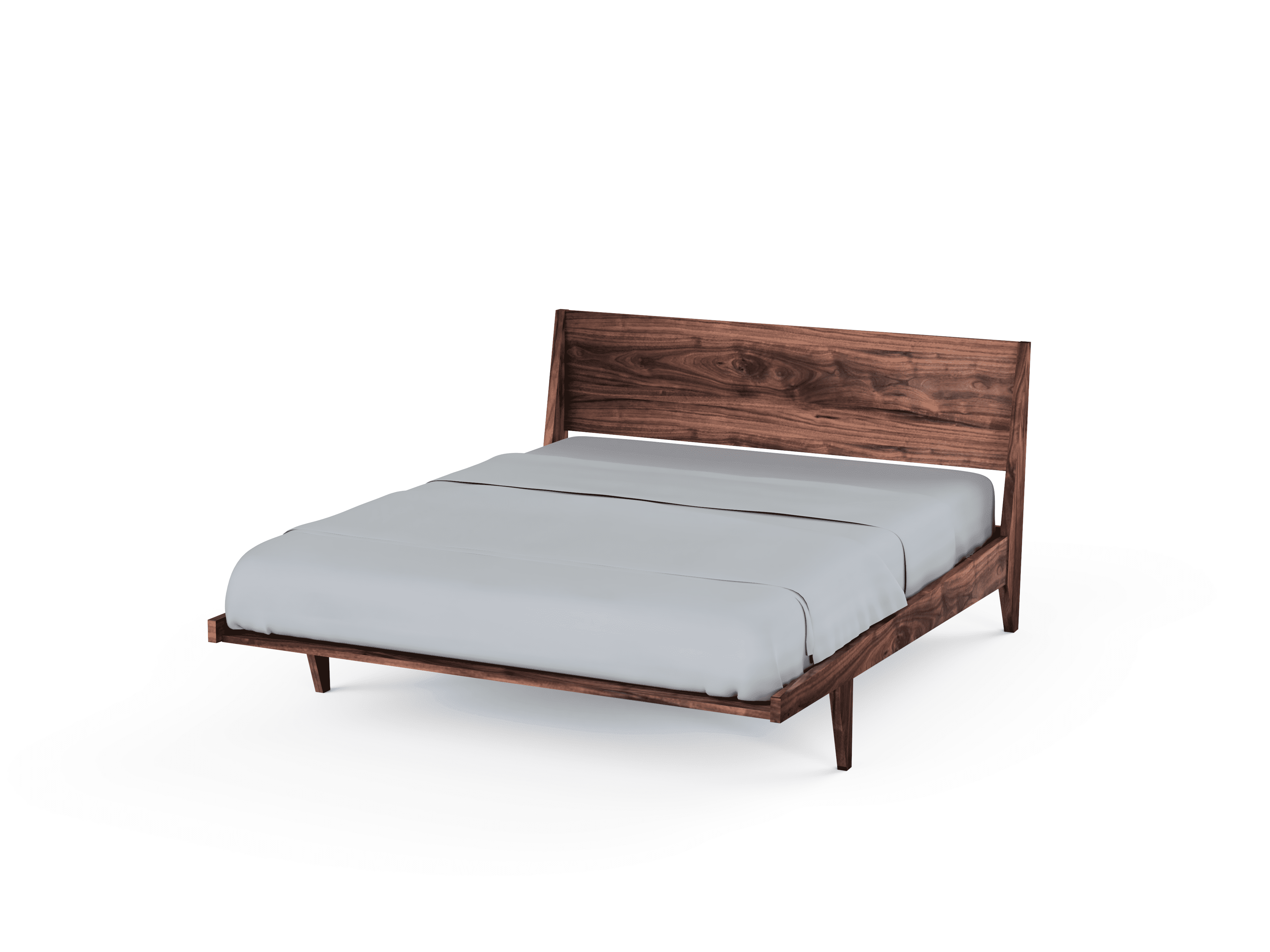 The Modern "ONE" Platform Bed by TY Fine Furniture is a handmade solid wood bed frame with a slanted headboard and light gray bedding, made in the USA and shown on a white background.