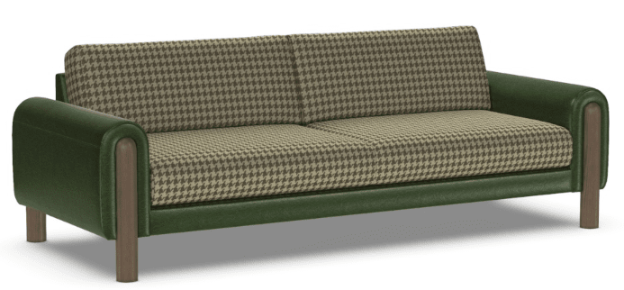The American Leather Revie Sofa by American Leather features green leather armrests and base, solid walnut legs, and seat and back cushions in a green and beige houndstooth fabric.
