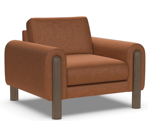 The American Leather Revie Chair by American Leather features a wide, high-density foam seat and backrest upholstered in brown fabric, with rounded armrests and solid walnut wood legs for a contemporary style.