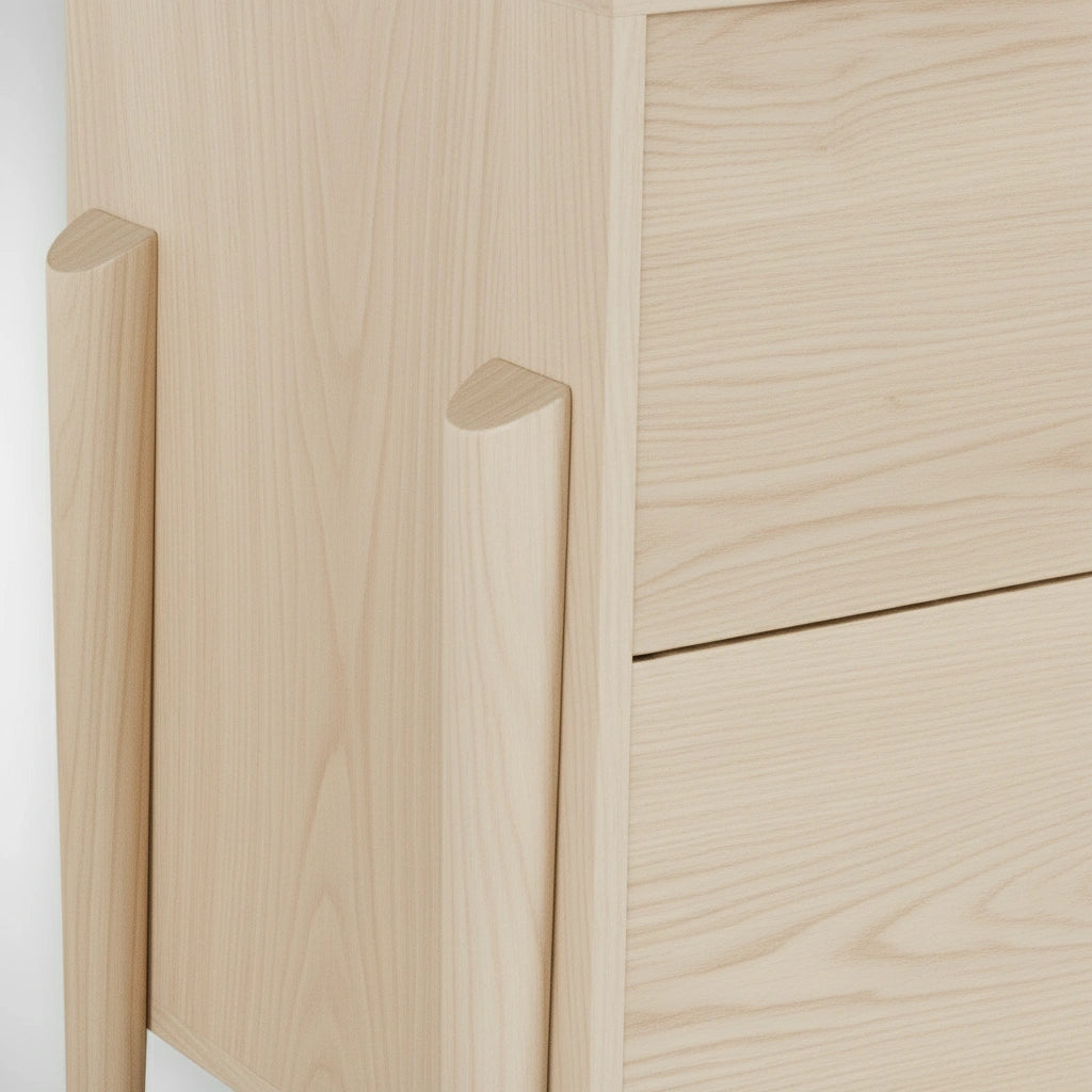 Close-up of the Apollo Dresser by TY Fine Furniture—a handcrafted, mid-century modern maple dresser with two drawers and smooth, rounded supports. Its visible wood grain accentuates a natural, minimalist style for any bedroom.