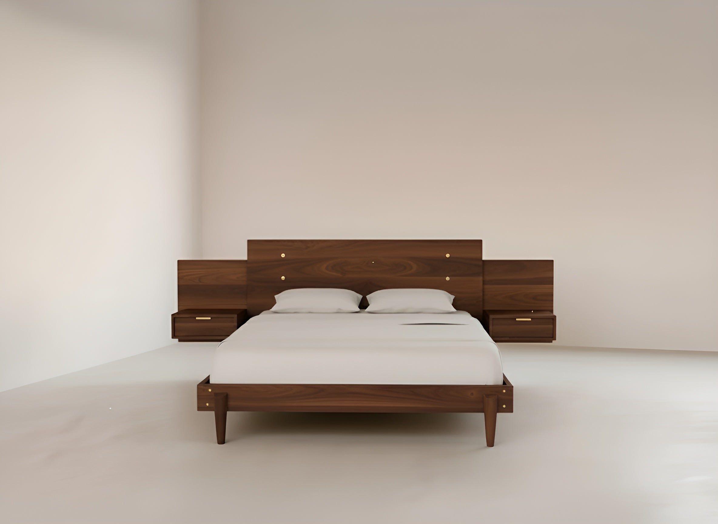 The Apollo Platform Bed with Integrated Tables Walnut by TY Fine Furniture, featuring a large headboard, two pillows, white bedding, and built-in nightstands, sits in a minimalist room with light walls and flooring.
