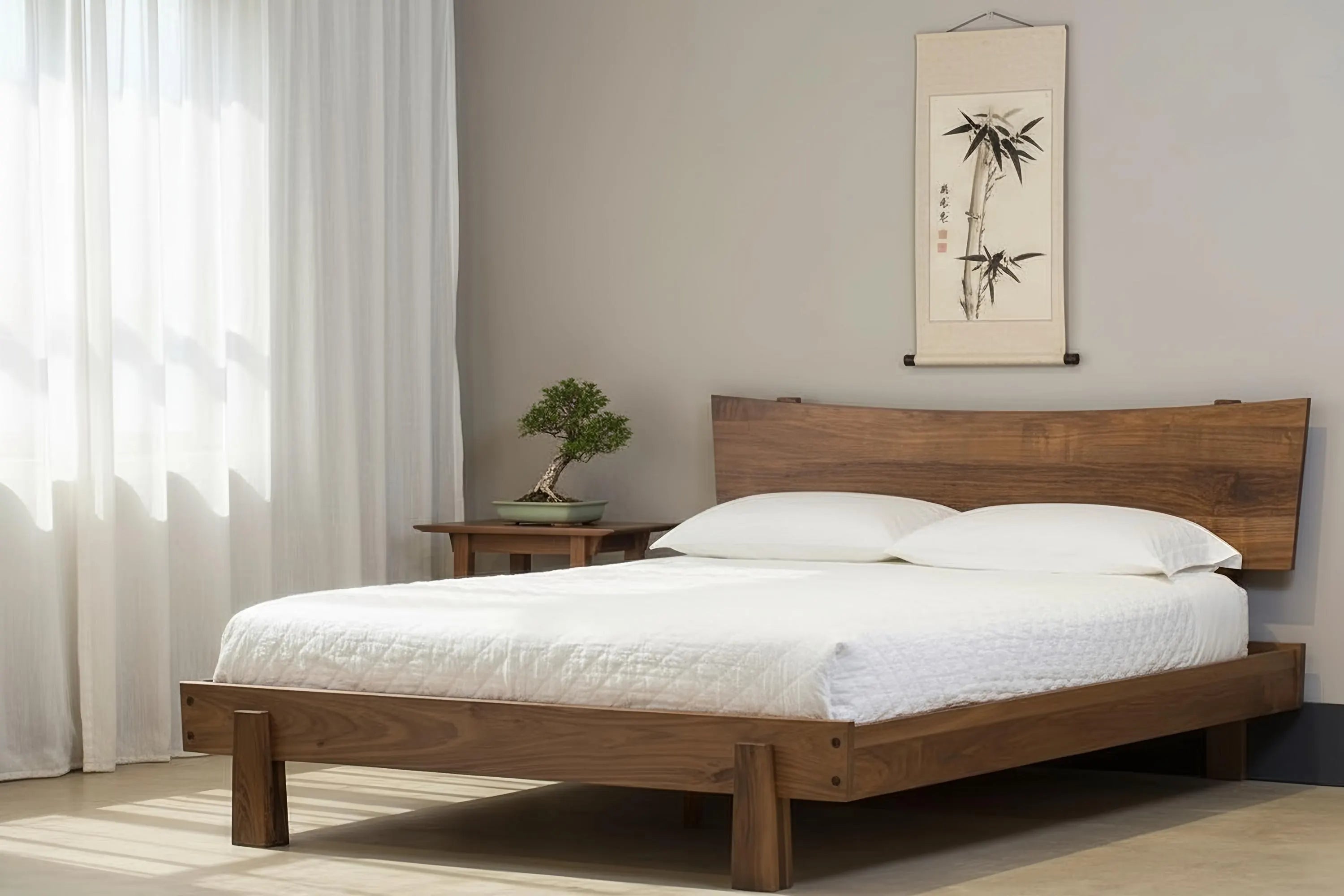 Horizon Platform Bed in walnut wood, inside a bedroom with Japanese aesthetic. The bed frame is made in USA, using natural hardwood.