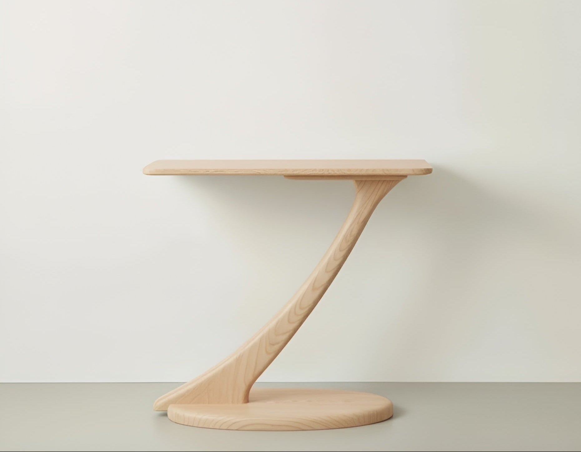 The Cantilever Console Hall Table by TY Fine Furniture features a minimalist maple design with a light finish, round base, single curved support, and rectangular top—an elegant cantilevered piece against a plain white background.