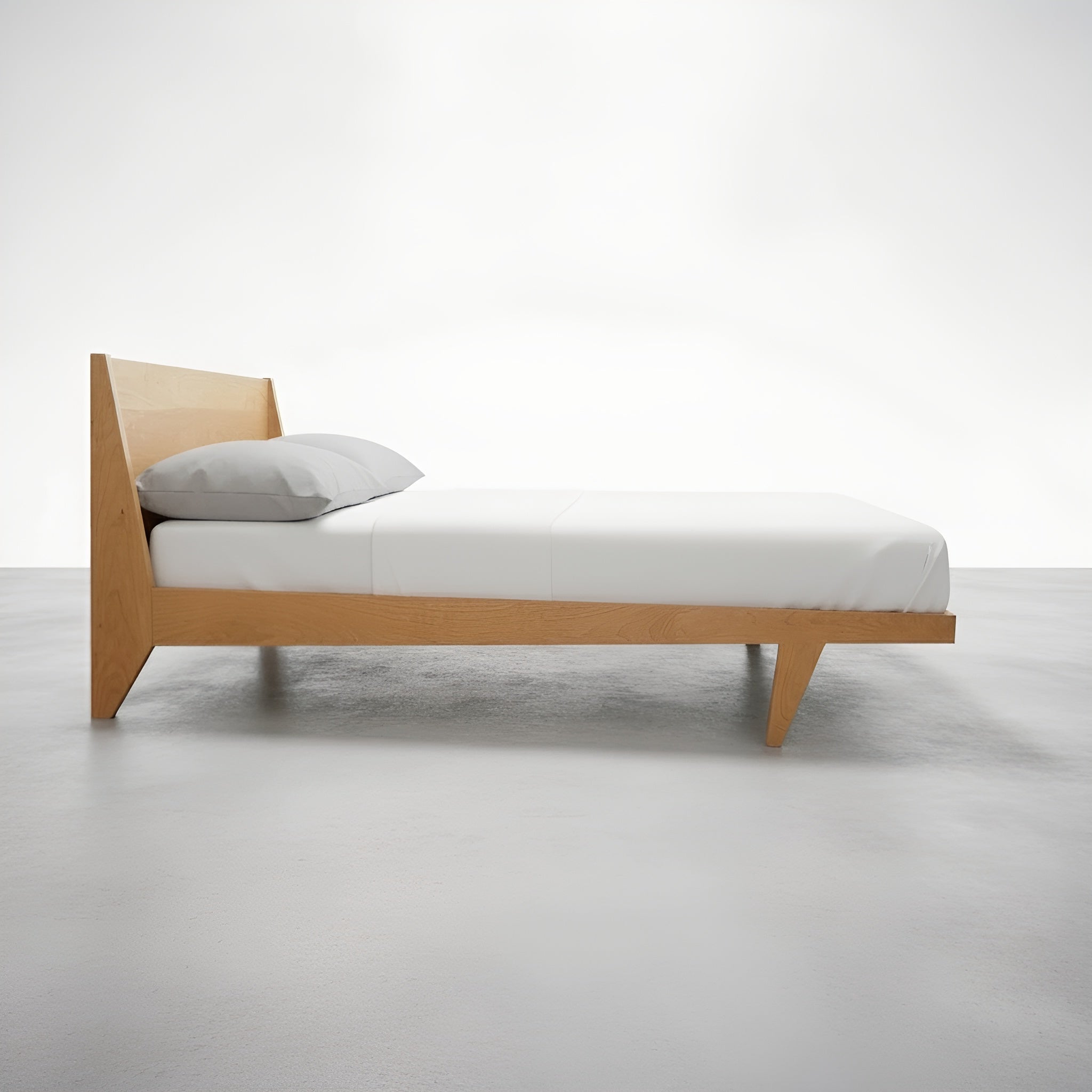 Side view of the Modern "ONE" Platform Bed in Cherry, made in the USA using natural hardwood