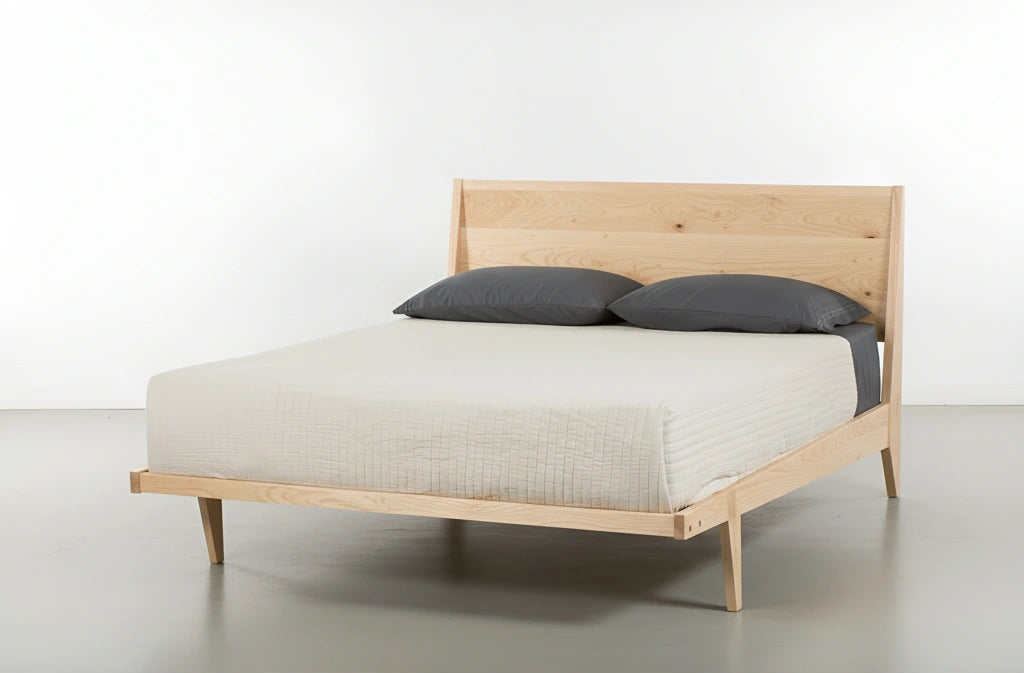 Front view of the Modern ONE Platform Bed in maple, made in the USA using natural hardwood.