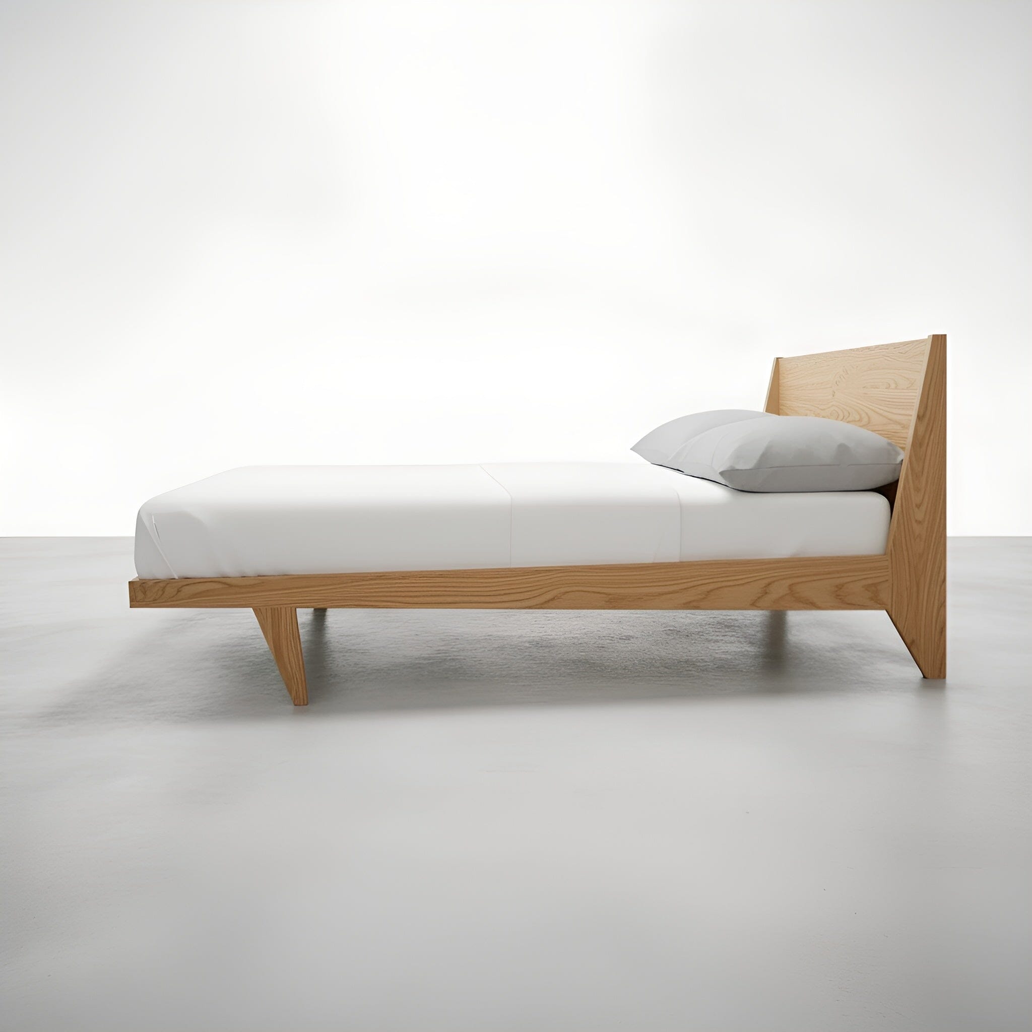 Side view of the Modern ONE Platform Bed in white oak, made in the USA using natural hardwood, by T.Y. Fine Furniture.