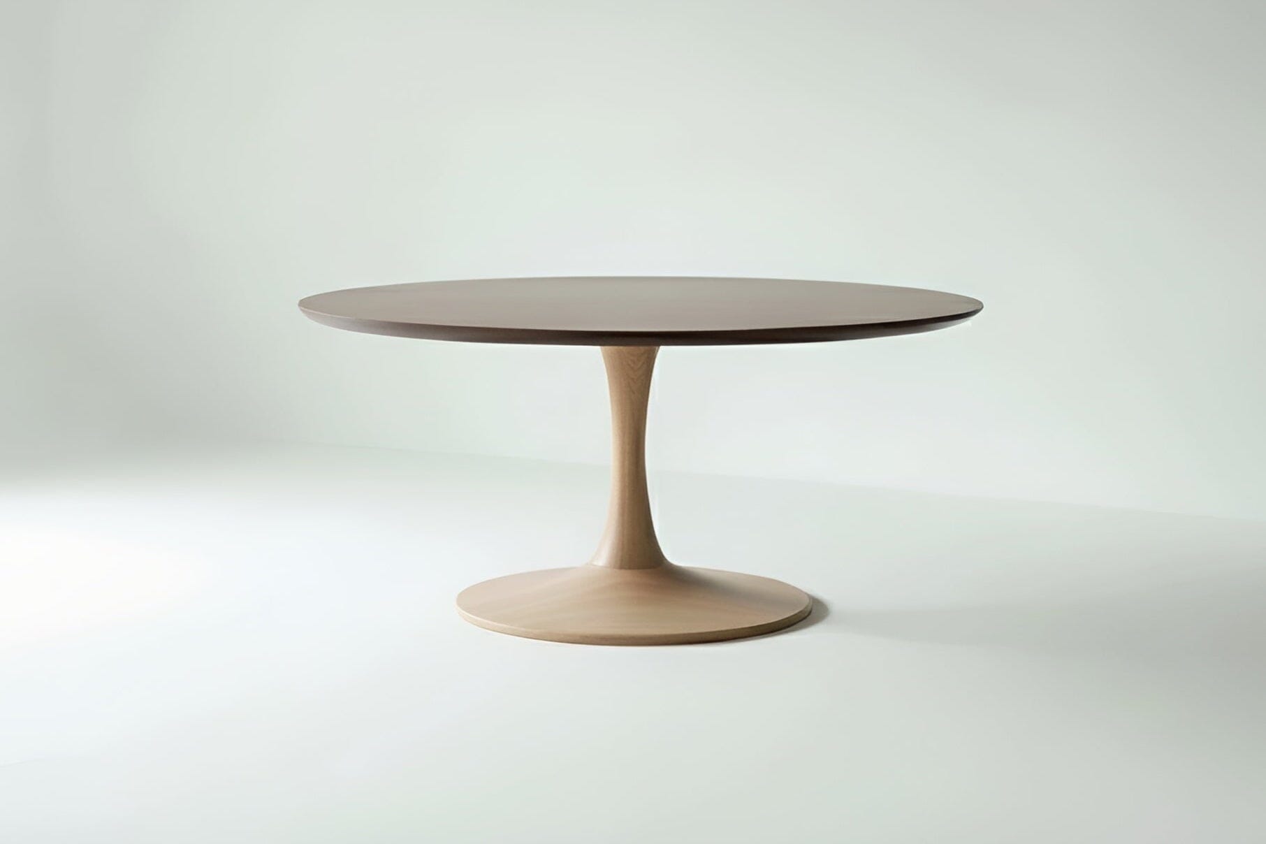 The T.Y. Fine Furniture Tulip Solid Wood Table features a walnut top and maple pedestal base, blending modern style with quality materials. Shown against a plain white background.
