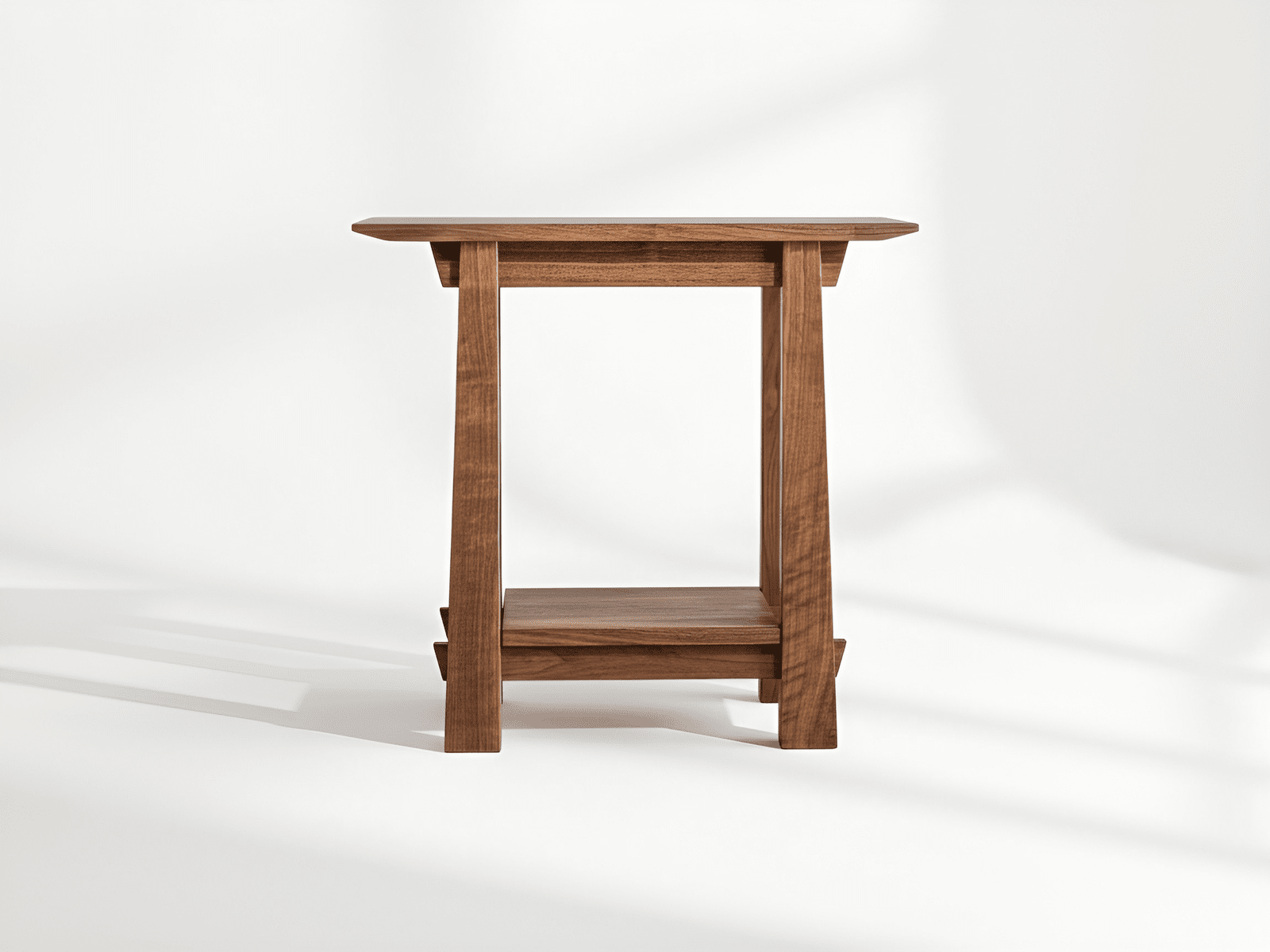 The Horizon Side Table in Walnut by TY Fine Furniture features a solid wood rectangular top, four angled legs, and a lower shelf, inspired by Japanese design. Photographed on a plain white background with soft shadows. Made in Columbus, OH.