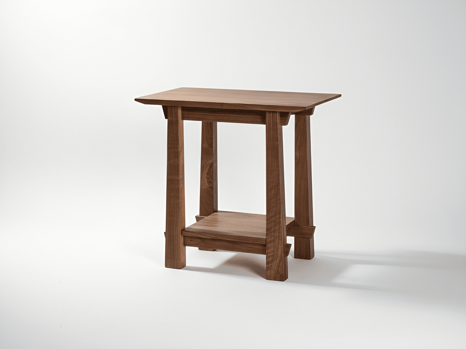 The Horizon Side Table in Walnut by TY Fine Furniture features a solid wood rectangular top, four straight legs, and a lower shelf. This modern Japanese-inspired piece is photographed against a plain white background. Made in Columbus, OH.