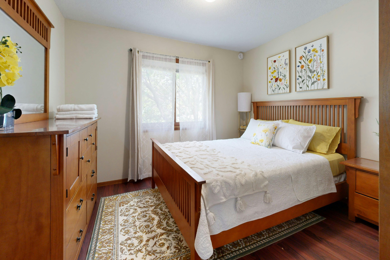 Bedroom with traditional-looking wood furniture
