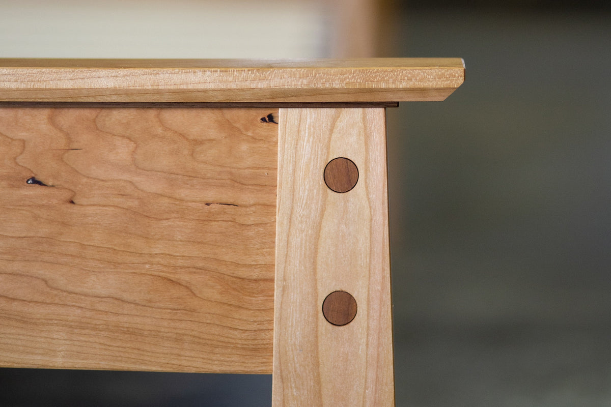Close-up of the Enso Platform Bed's rails and legs, which are connected by many types of wood joints