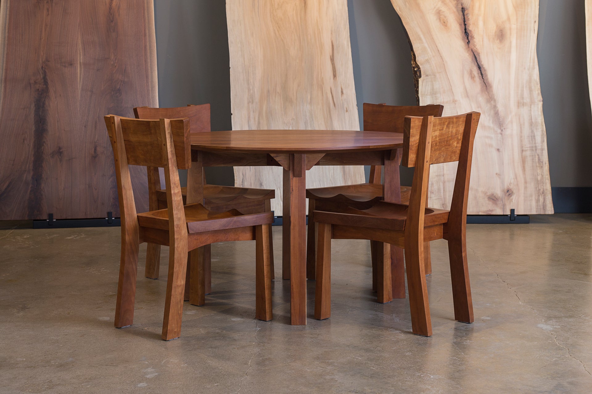 Wooden table and dining chairs, crafted by TY Fine Furniture