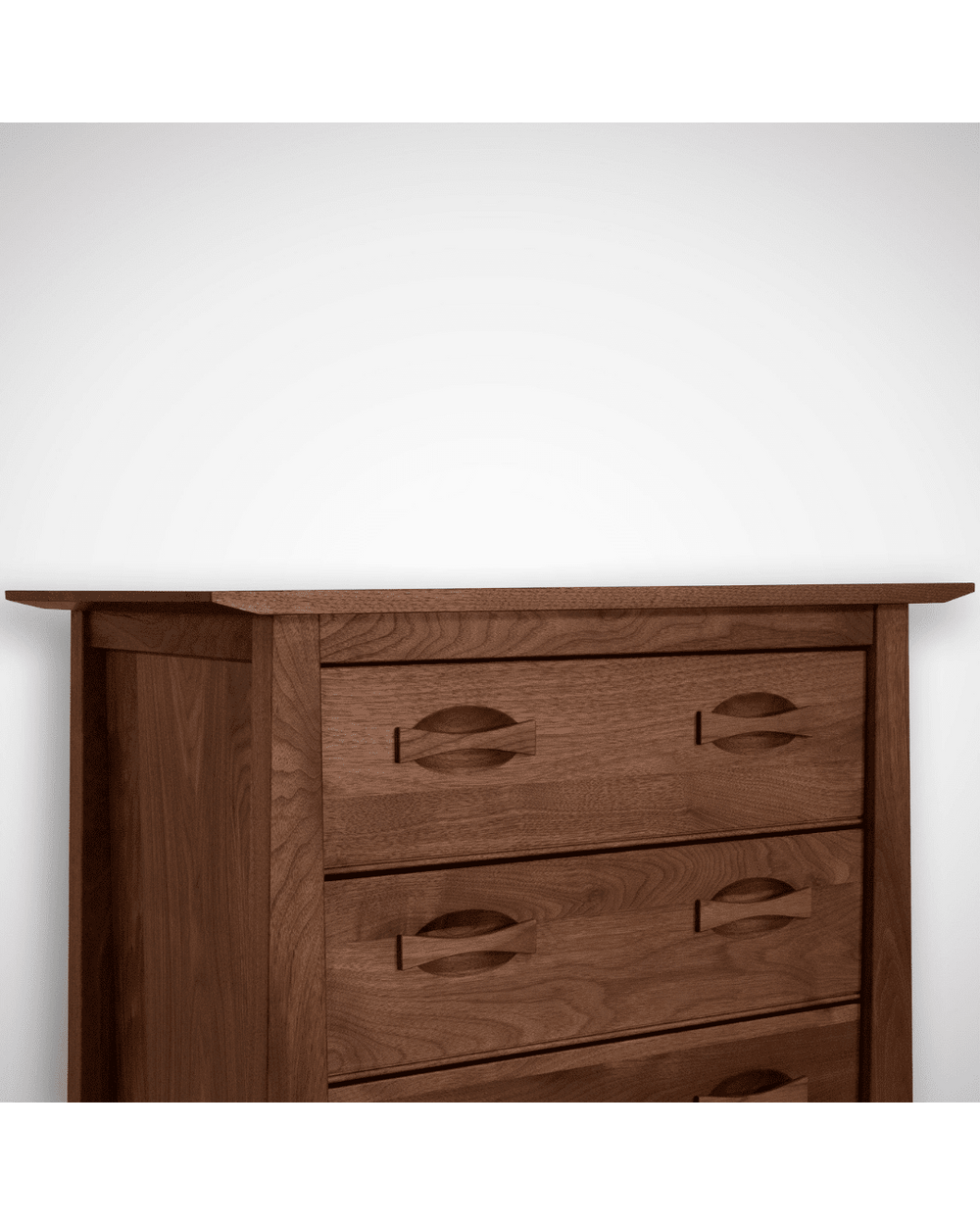 A close-up of the dresser's drawers