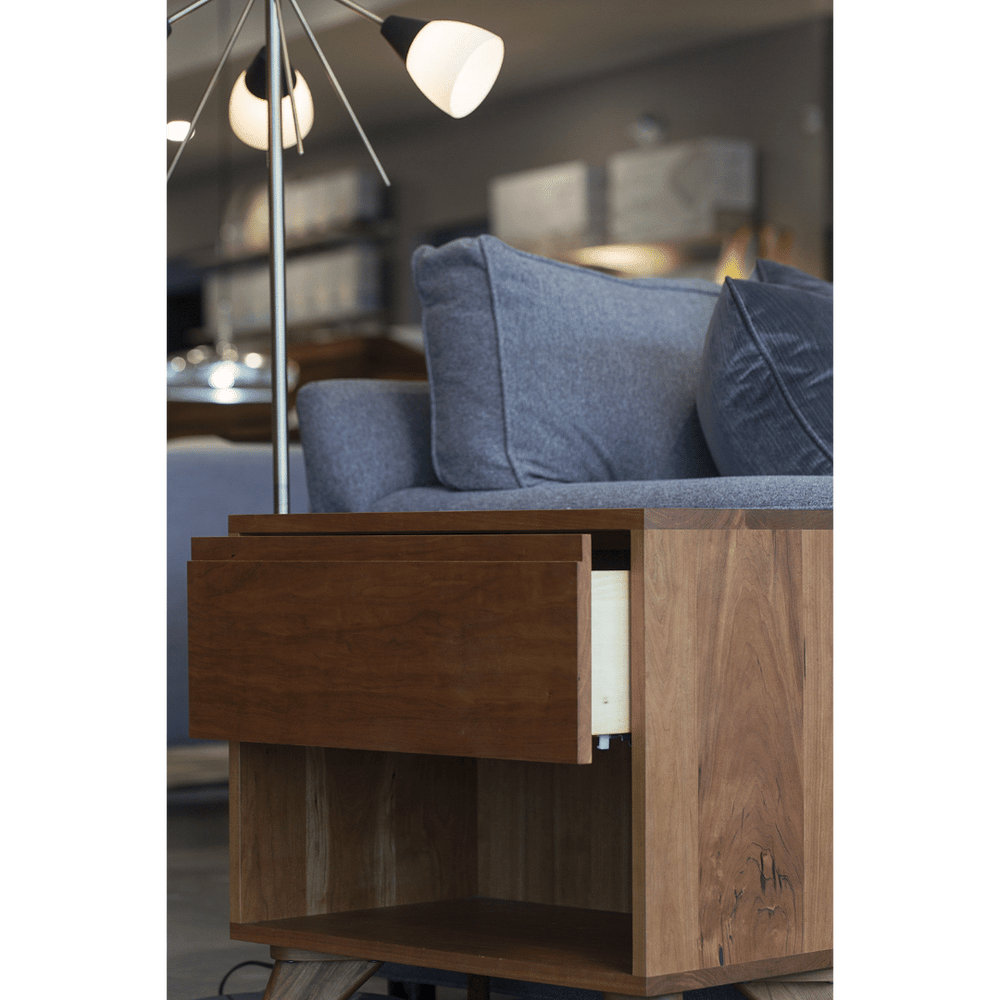 Same nightstand in light maple finish showing two-drawer setup and open shelf.