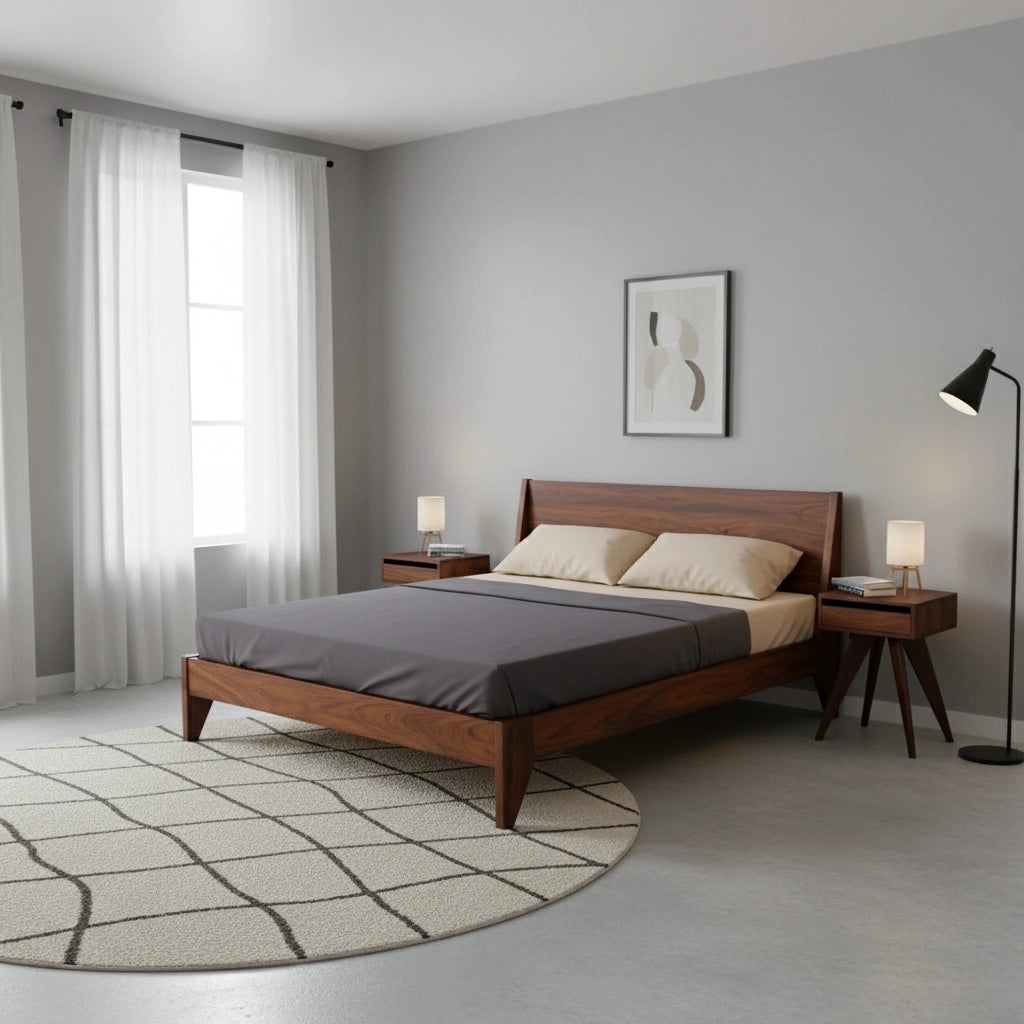 A modern bedroom featuring TY Fine Furniture's Modern "TWO" Platform Bed in solid walnut, gray bedding, wooden nightstands with lamps, a round patterned rug, black floor lamp, and a large window with sheer white curtains.