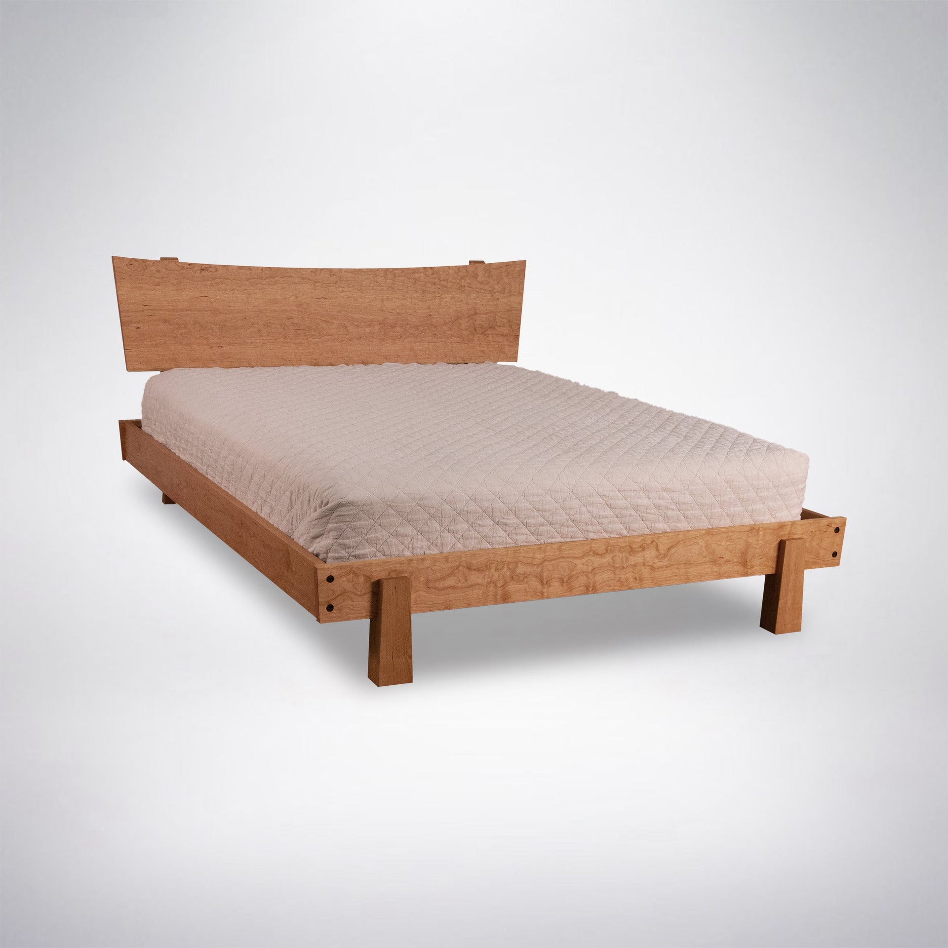 Modern Platform Bed in natural cherry wood.