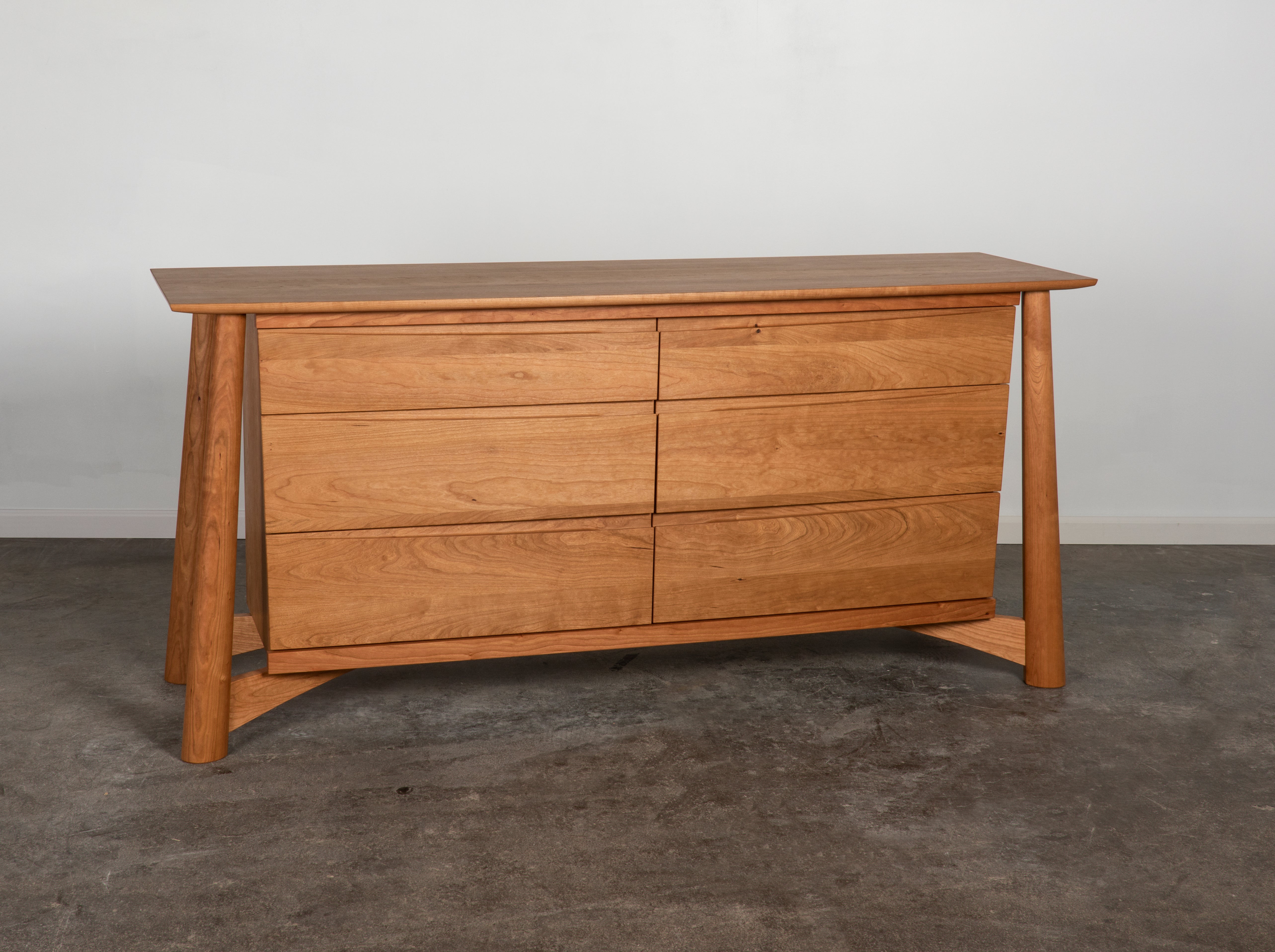 Sunrise Dresser in Cherry, with six drawers. It's made in USA, using natural solid wood. 